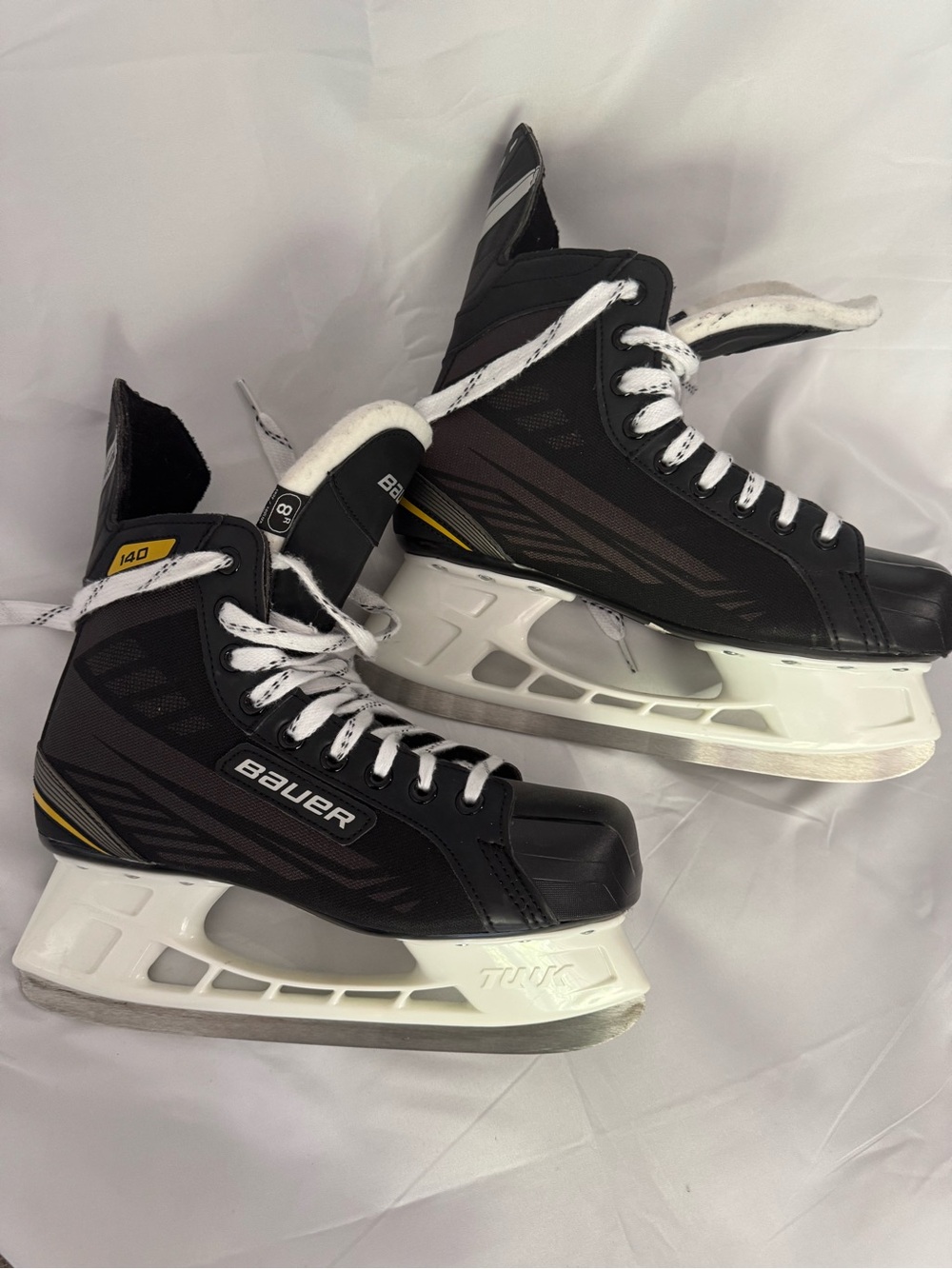 Bauer 140 Black and White Men's Ice Hockey Skates with Yellow Accent